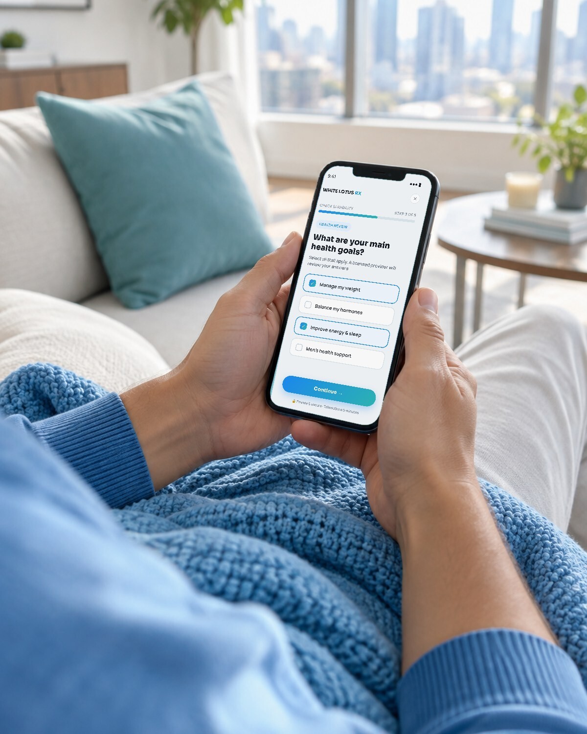 Person on a sofa completing the White Lotus eligibility health review on their phone